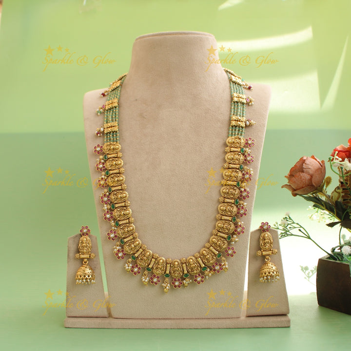 Gorgeous Lakshmi carved floral long necklace with ruby emerald and mint green beads