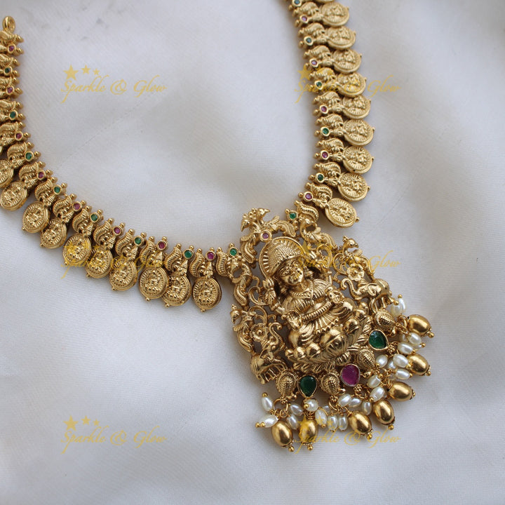 Elegant Premium Matt Lakshmi peacock coin short necklace with ruby emerald and rice pearls
