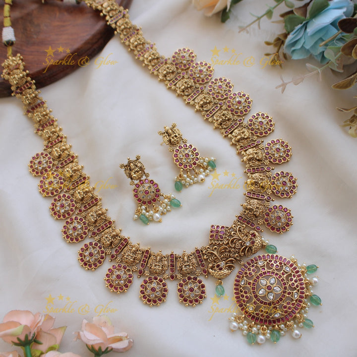 Gorgeous Lakshmi peacock carved floral design bottu long necklace with kemp stones and mint green beads