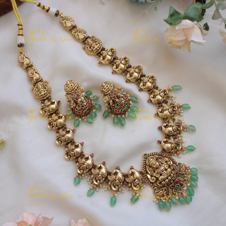 Grand Lakshmi peacock carved long necklace with ruby emerald and mint green beads