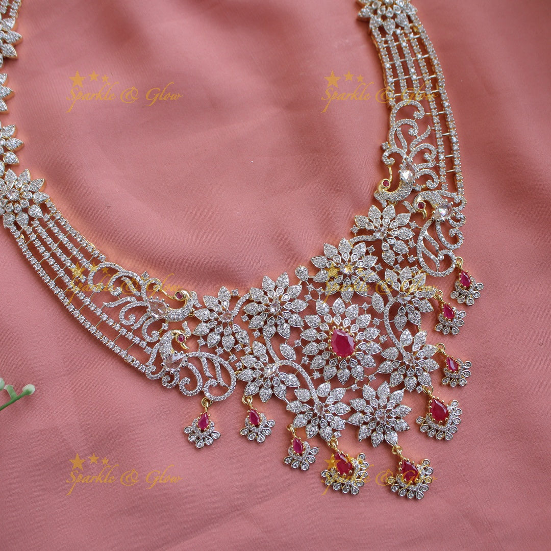 Sparkling Floral peacock design American diamond long necklace with ruby stones - pink