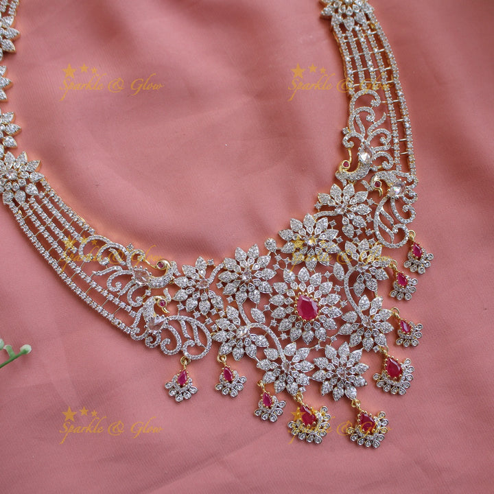 Sparkling Floral peacock design American diamond long necklace with ruby stones - pink