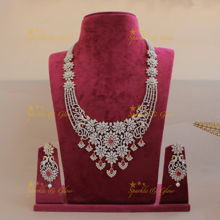 Sparkling Floral peacock design American diamond long necklace with ruby stones - pink