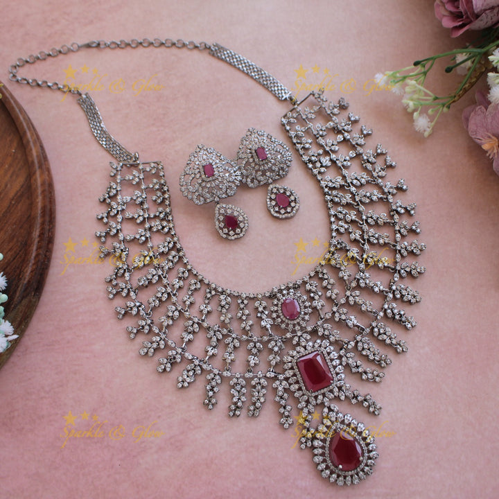 Glittering Three layer black finish American diamond short necklace with ruby and emerald stones - multi