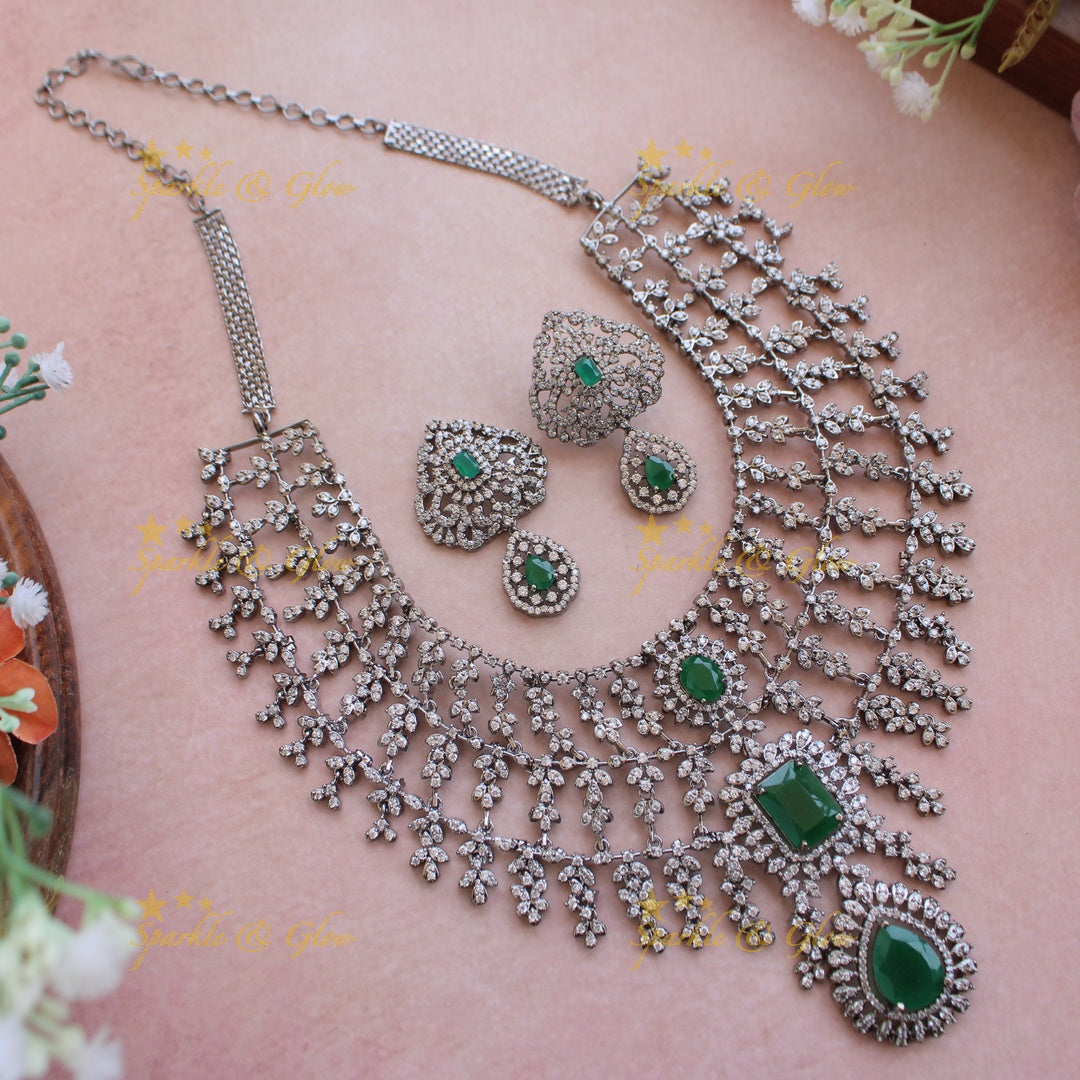 Glittering Three layer black finish American diamond short necklace with ruby and emerald stones - multi