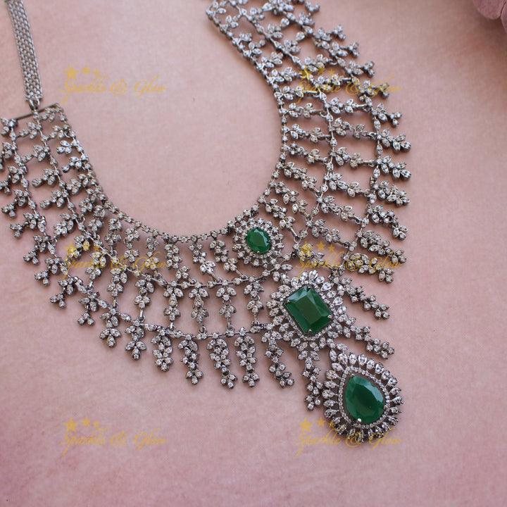 Glittering Three layer black finish American diamond short necklace with emerald stones - green