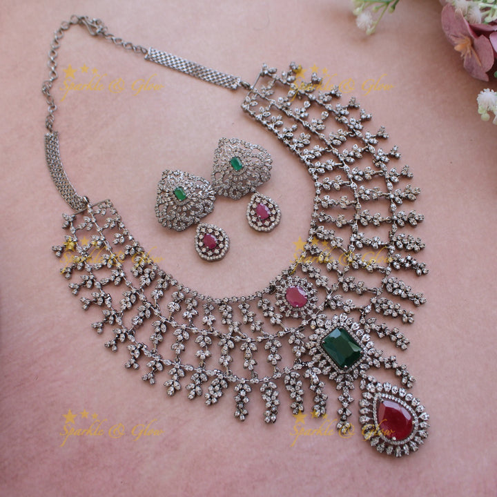 Glittering Three layer black finish American diamond short necklace with ruby and emerald stones - multi