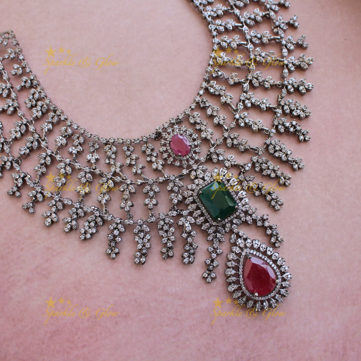 Glittering Three layer black finish American diamond short necklace with ruby and emerald stones - multi