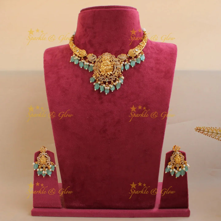Premium Matt Godess Durga carved short necklace with CZ stones and sea blue beads - Sparkle and Glow