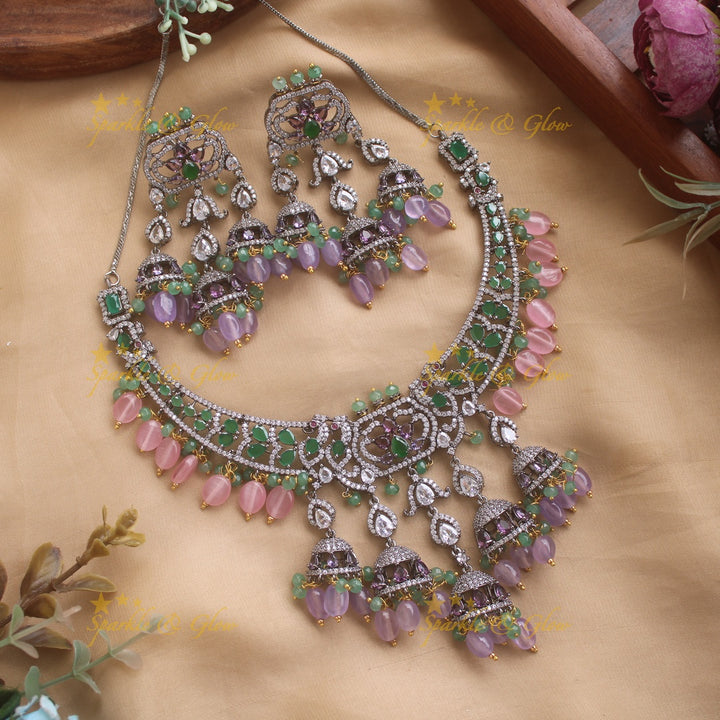 Gorgeous Peacock design black finish victorian AD short necklace with jhumuka drops green stones pink and purple beads