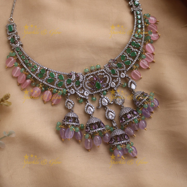 Gorgeous Peacock design black finish victorian AD short necklace with jhumuka drops green stones pink and purple beads