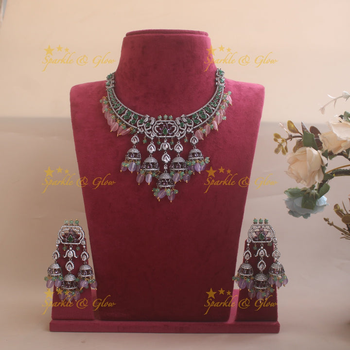 Gorgeous Peacock design black finish victorian AD short necklace with jhumuka drops green stones pink and purple beads