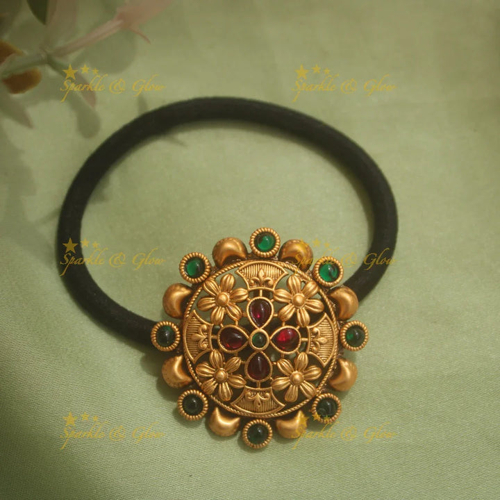 Elegant gold alike floral hair band with green and red stones - Sparkle and Glow