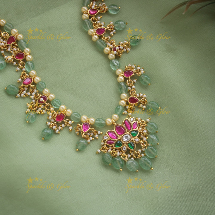 Statement Lotus design jadau short necklace with pearls and mint green beads