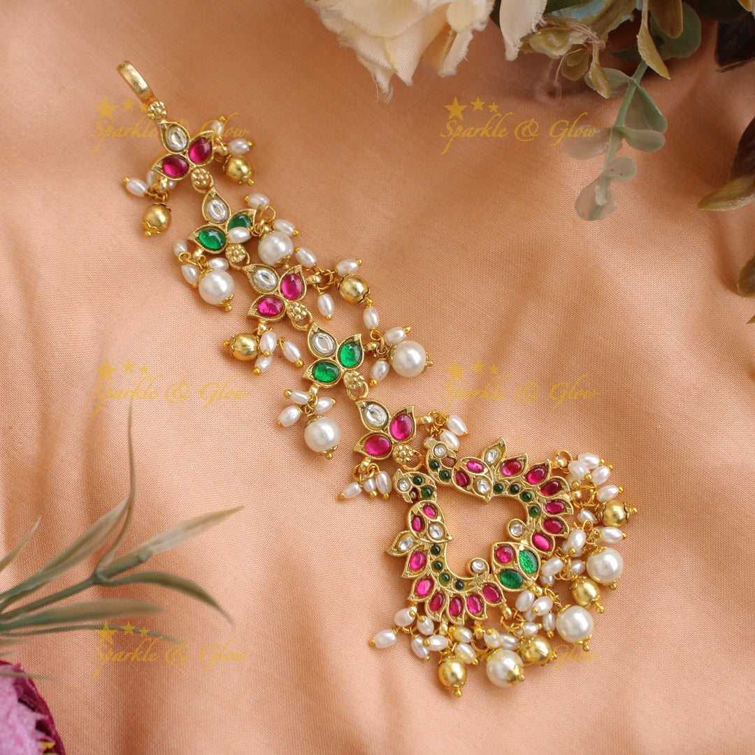 Intricately Carved Jadau Peacock Floral Tikka with Gold and pearl beads