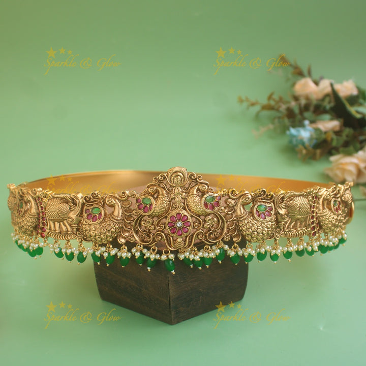 Gorgeous Peacock carved hipbelt with ruby emerald and mint green beads