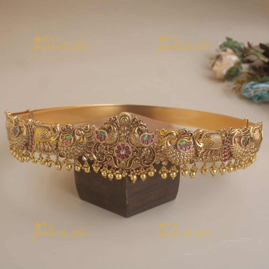 Gorgeous Peacock carved hipbelt with ruby emerald and mint green beads