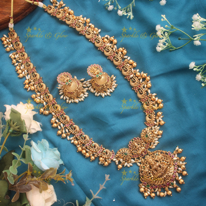 Premium matte Lakshmi peacock carved long necklace with rice and gold beads