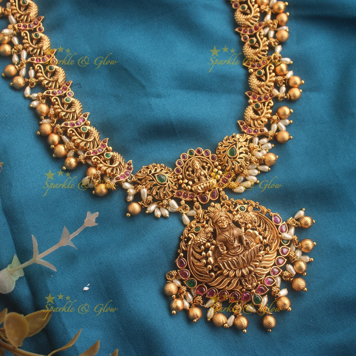 Premium matte Lakshmi peacock carved long necklace with rice and gold beads