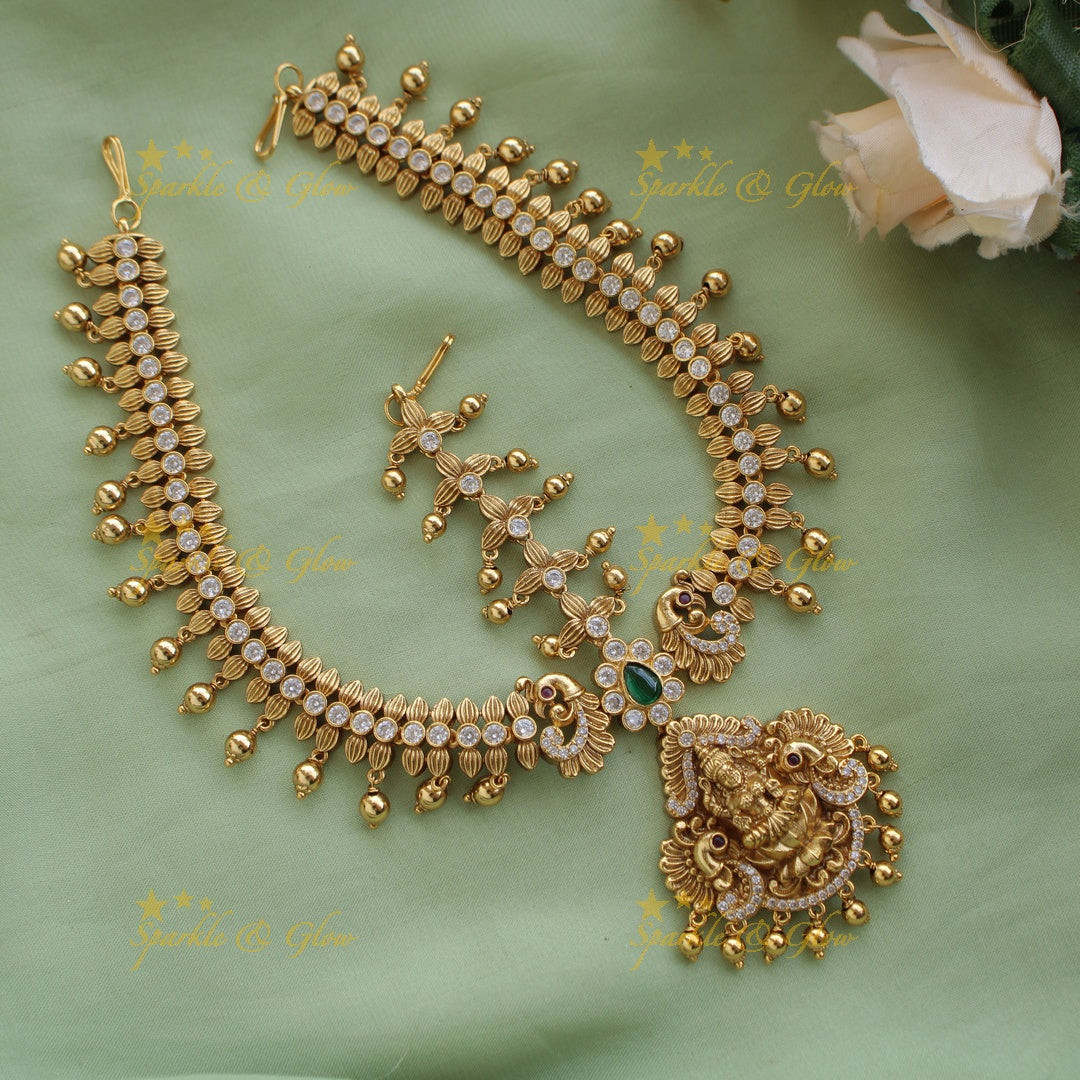 Idol Lakshmi Peacock Floral Bridal Tikka with Gold beads