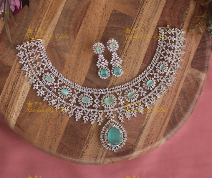 Stunning Floral leaflet design American diamond short necklace with emerald stones - green