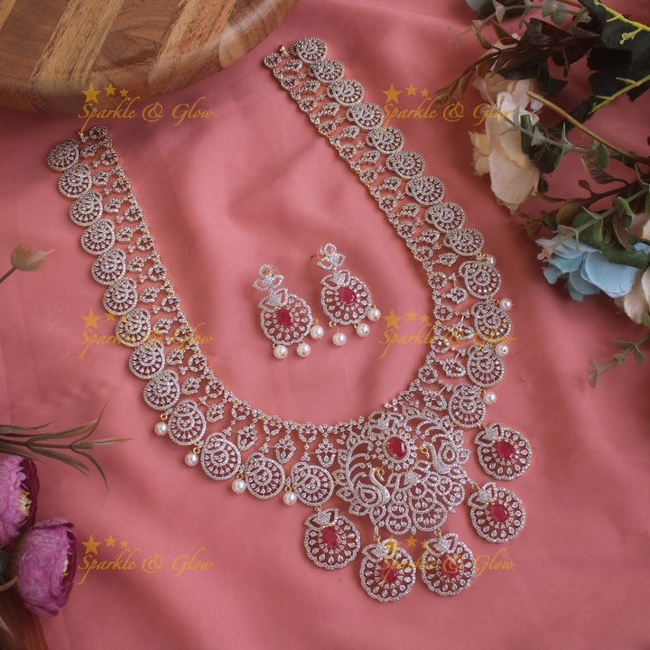 Sparkling Peacock Floral design American diamond long necklace with emerald and pearls - green