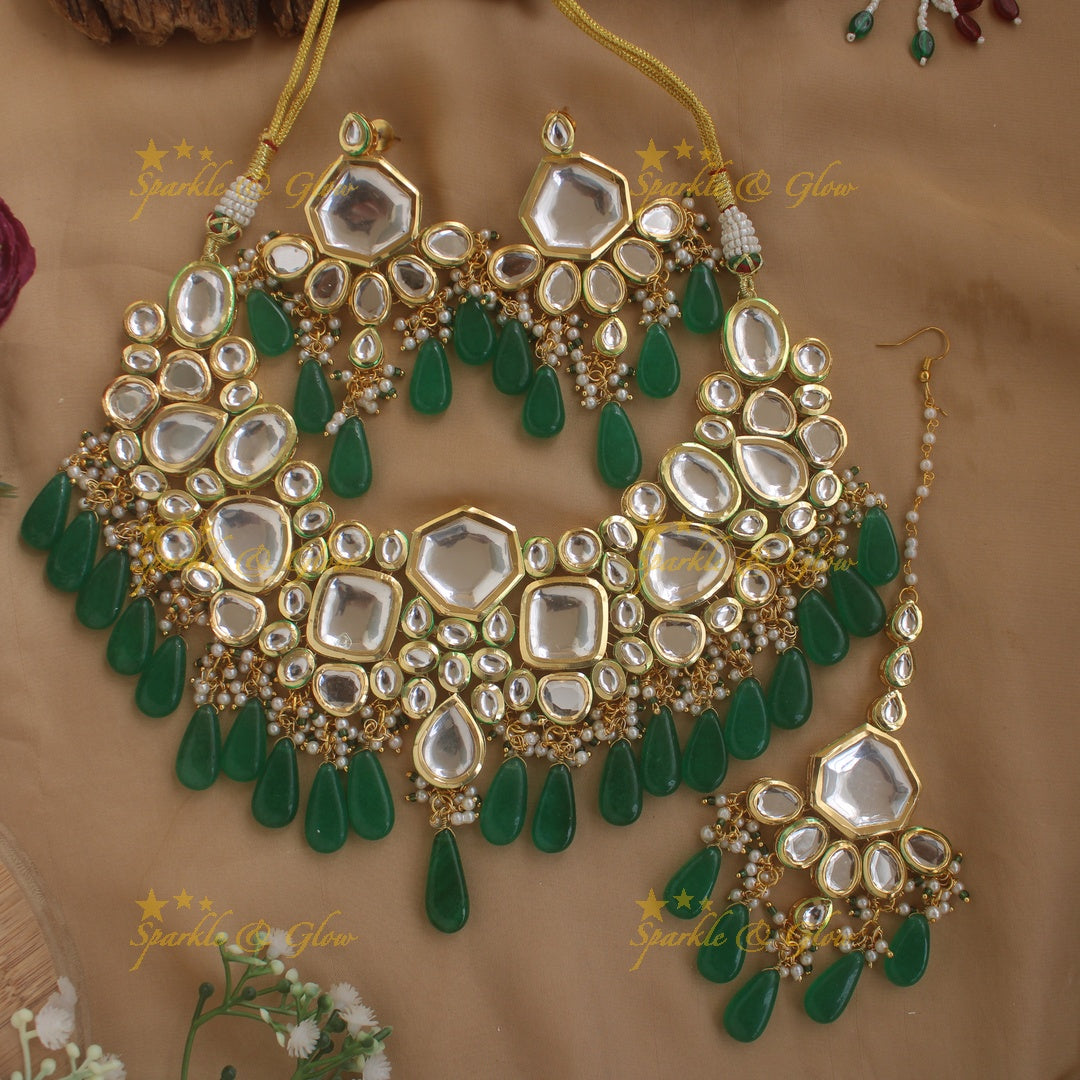 Grand Kundan Stone Bridal short necklace with pearls and green beads with maang tikka