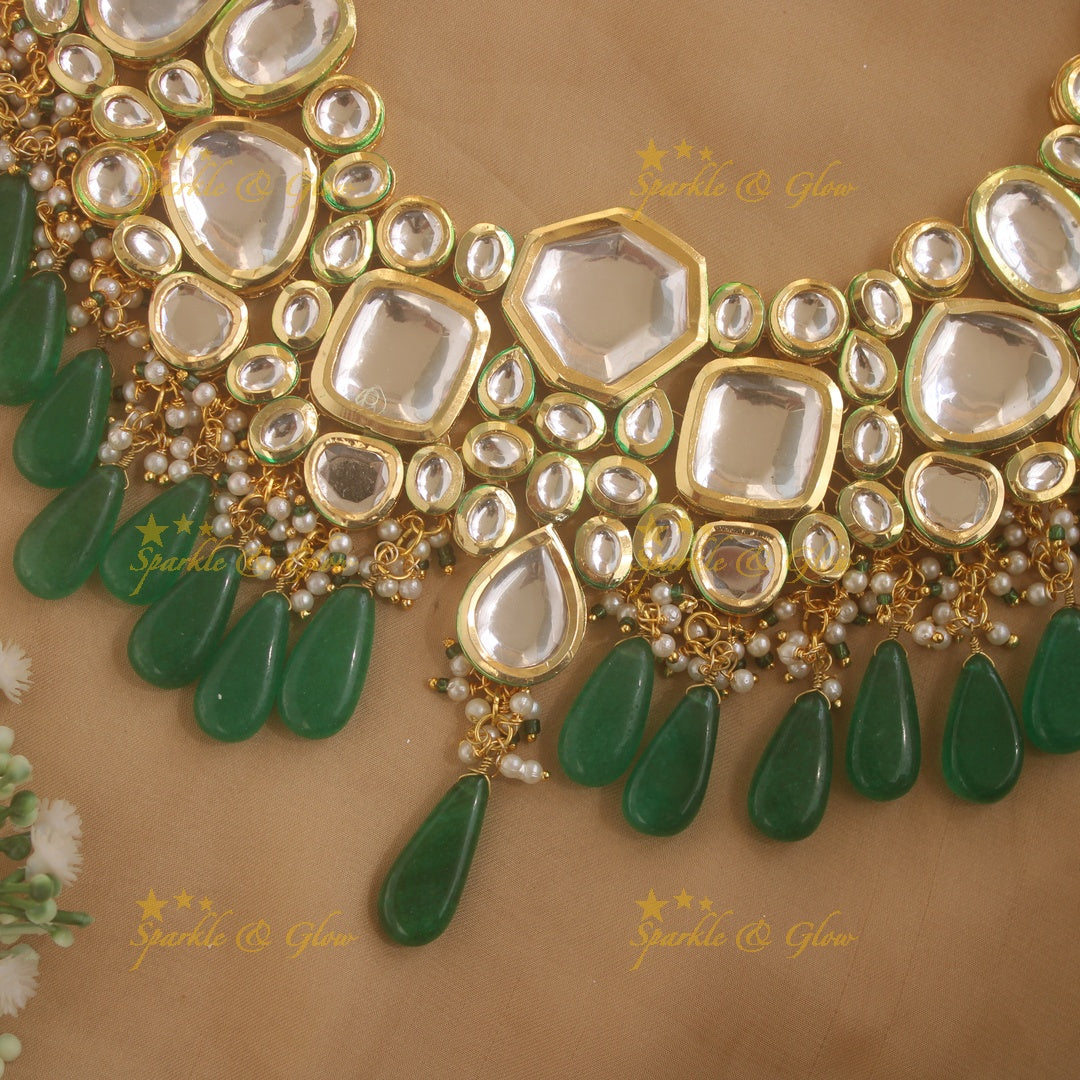 Grand Kundan Stone Bridal short necklace with pearls and green beads with maang tikka