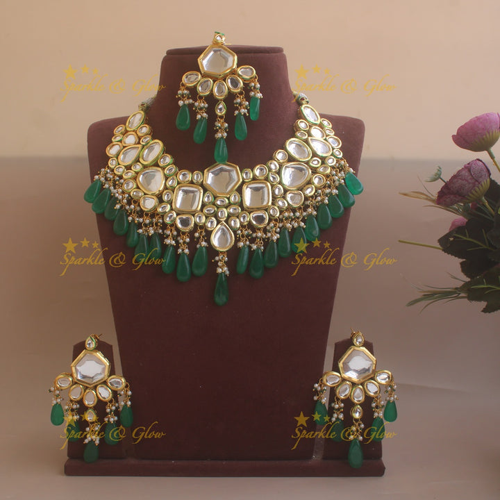 Grand Kundan Stone Bridal short necklace with pearls and green beads with maang tikka