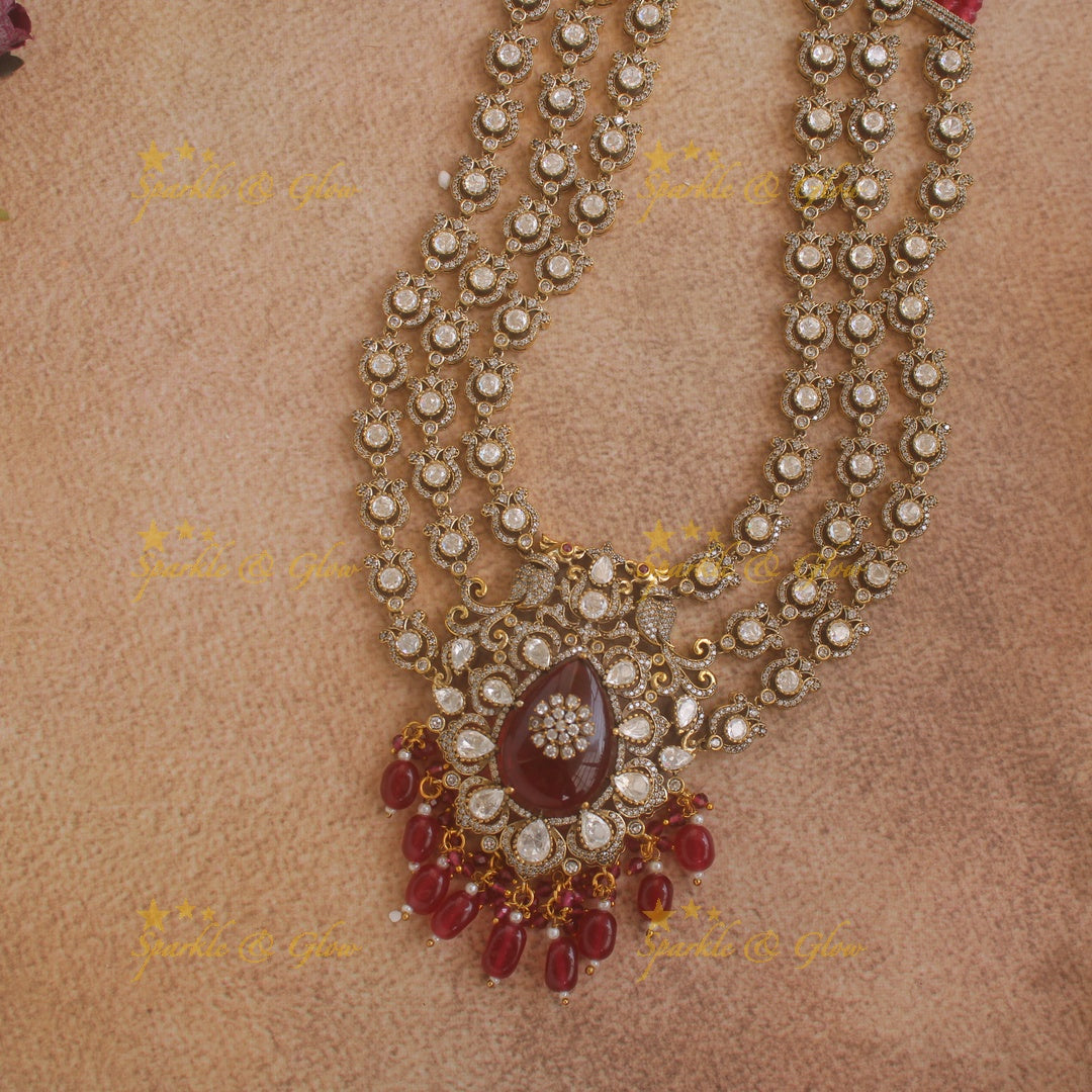 Stunning Floral Peacock Victorian AD Layer haram with red beads with maang tikka
