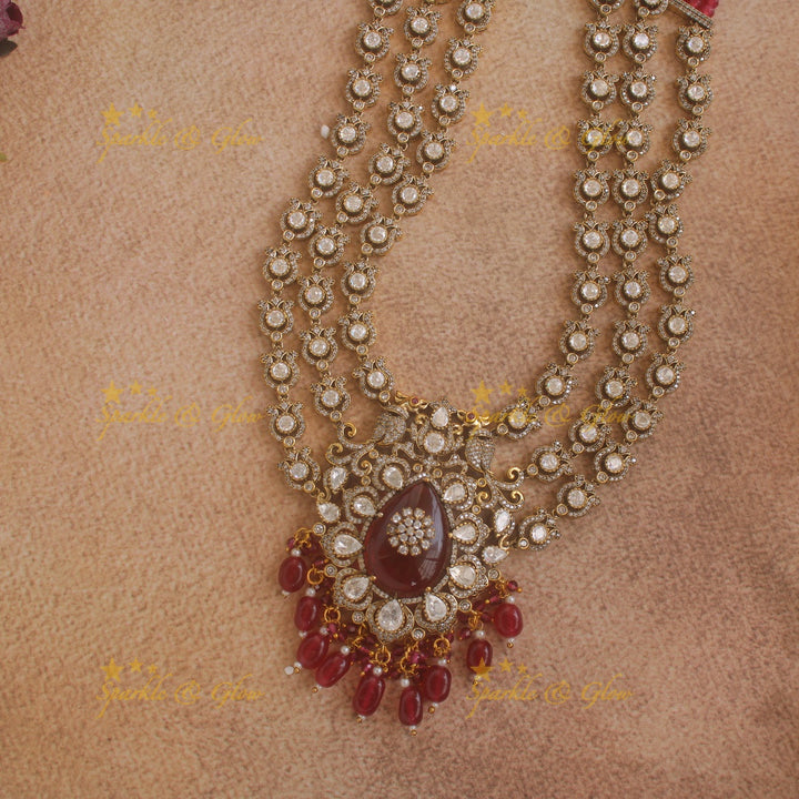 Stunning Floral Peacock Victorian AD Layer haram with red beads with maang tikka