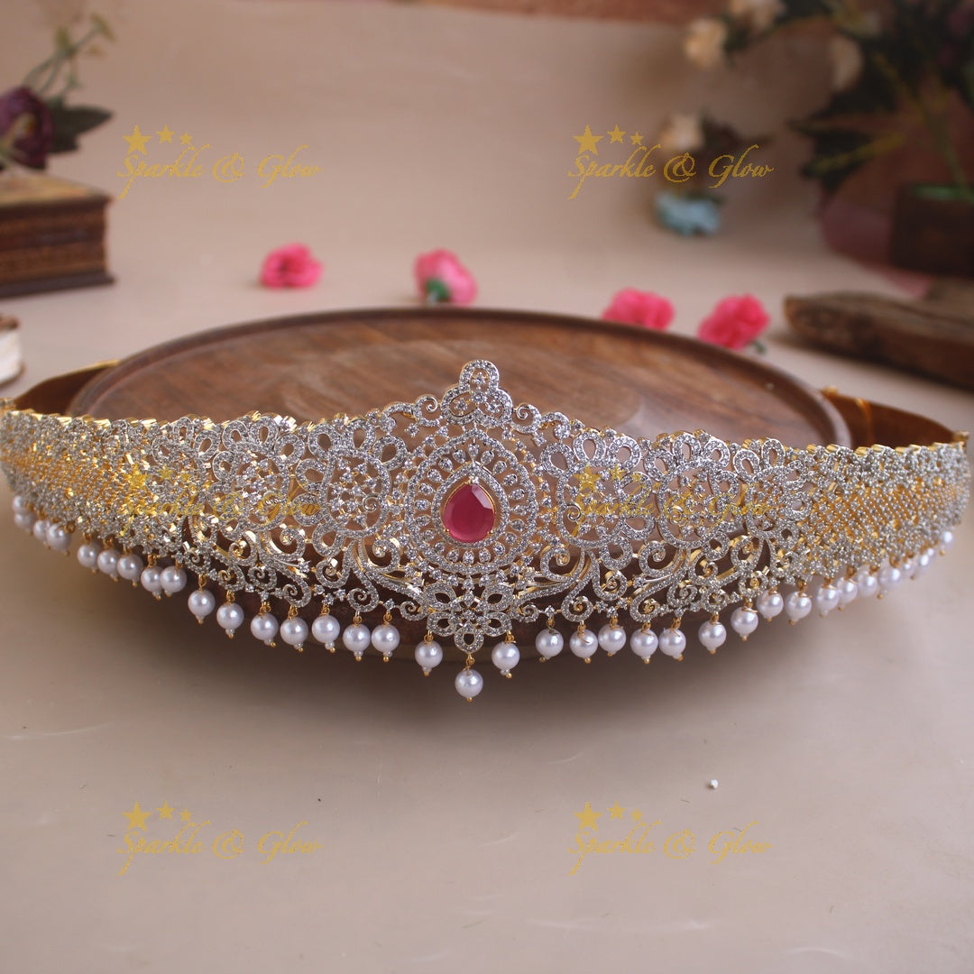 Glittering Floral and branch design American diamond hipbelt with emerald in centre and pearl drops