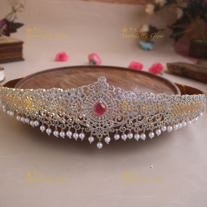 Glittering Floral and branch design American diamond hipbelt with emerald in centre and pearl drops