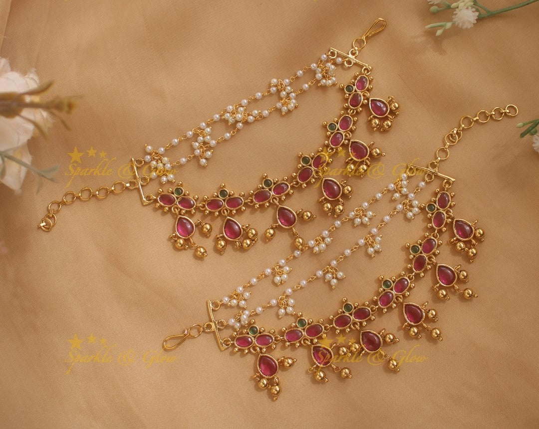 Elegant infinity symbol kemp earchain with oval stones and gold bead drops