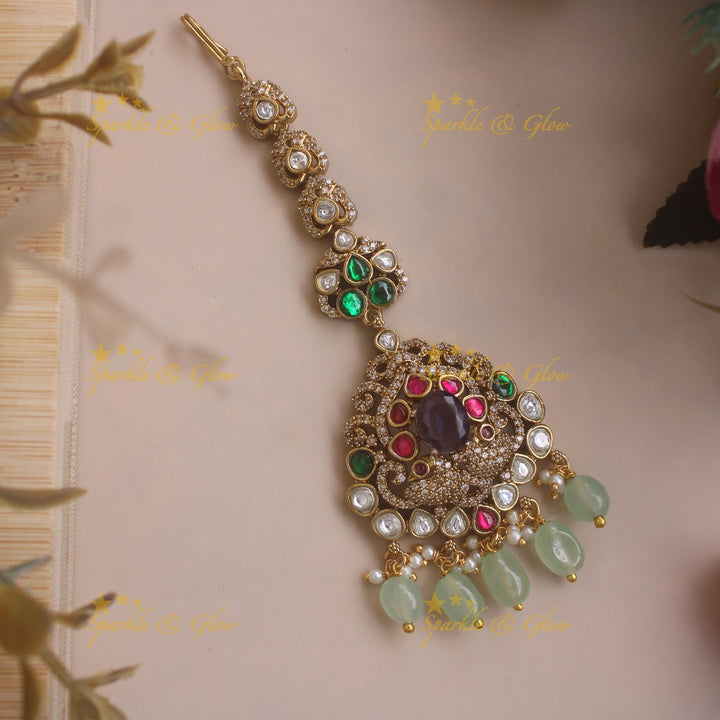Stunning Peacock design Victorian AD maang tikka with multi colour stones and purple beads