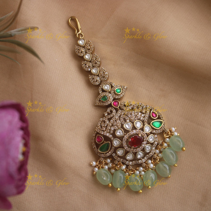 Grand Floral Victorian AD maang tikka with multi colour stones and mint green beads