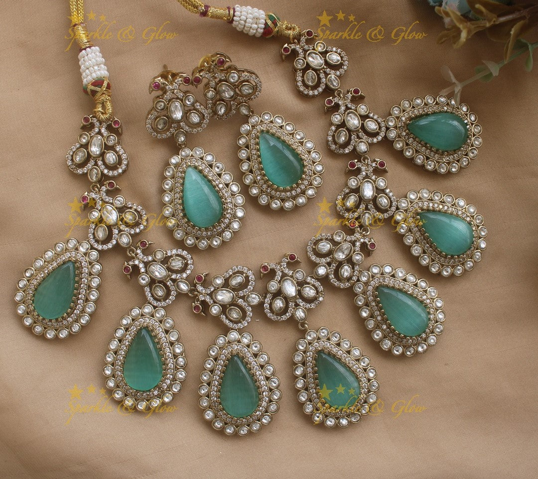 Stunning Dual Tone Peacock design victorian AD Necklace with Oval Stone droppings- Mint green