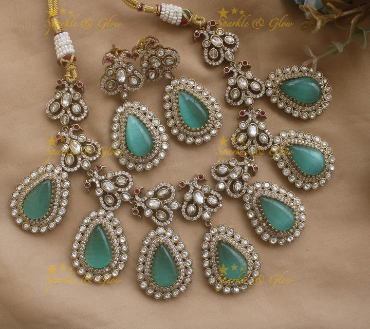 Stunning Dual Tone Peacock design victorian AD Necklace with Oval Stone droppings- Mint green