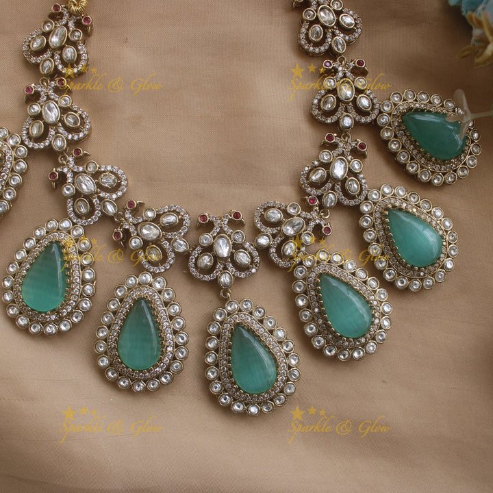 Stunning Dual Tone Peacock design victorian AD Necklace with Oval Stone droppings- Mint green