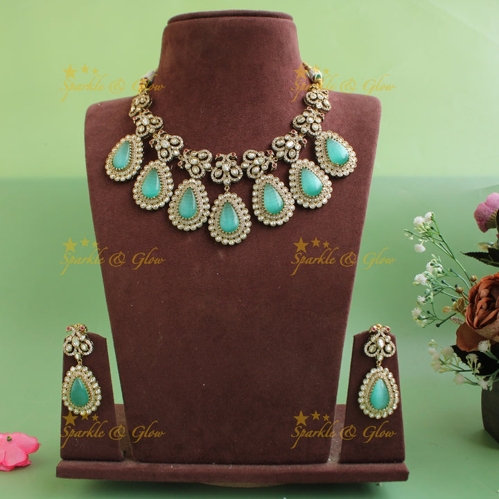 Stunning Dual Tone Peacock design victorian AD Necklace with Oval Stone droppings- Mint green