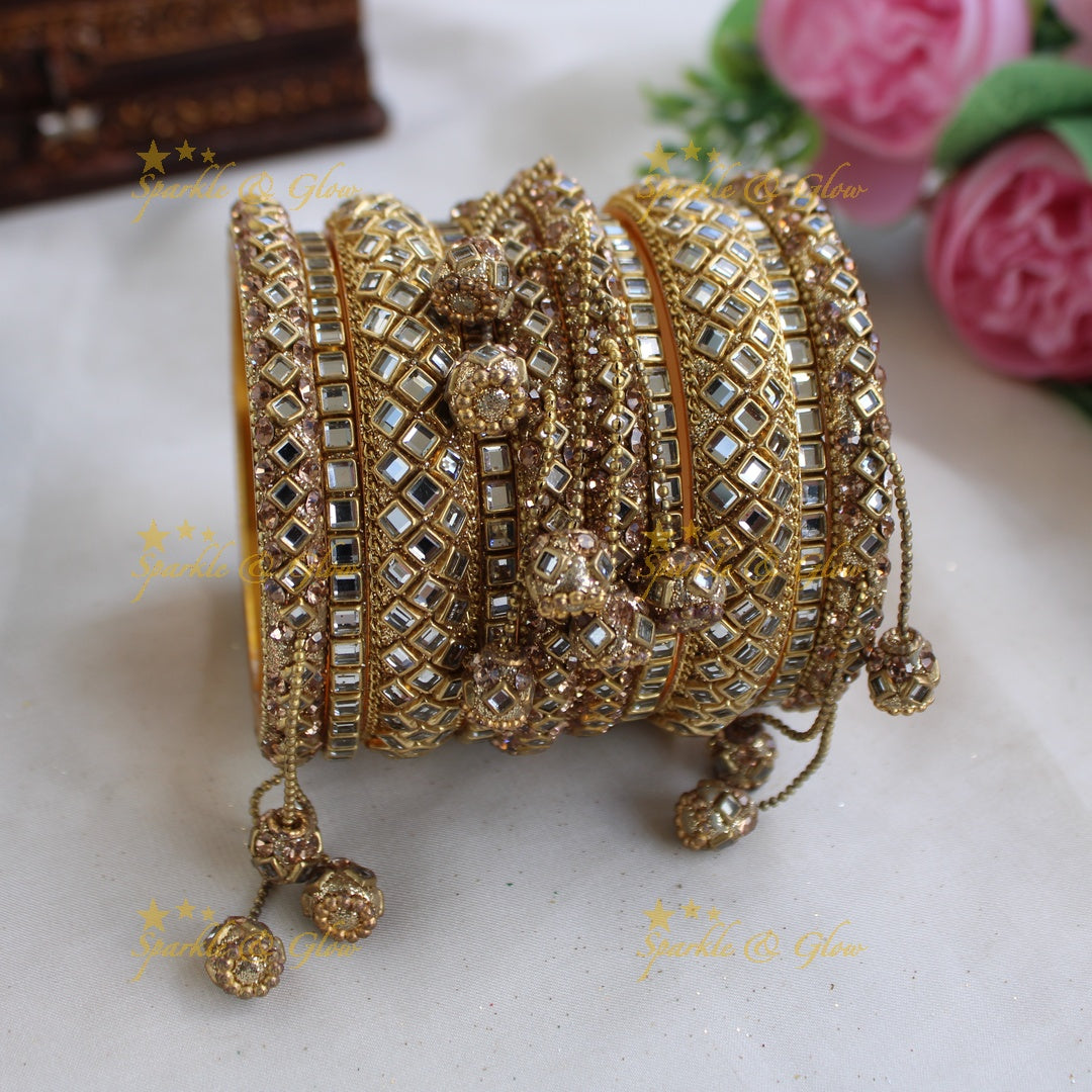 Beautiful kundan stone bridal bangle set with gold ball drops