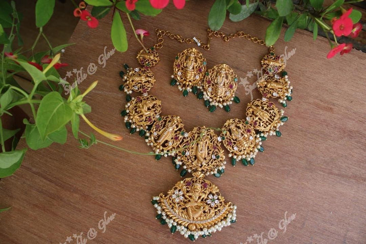 Gold alike polished Dashavathara neckalce set with green beads - Sparkle and Glow