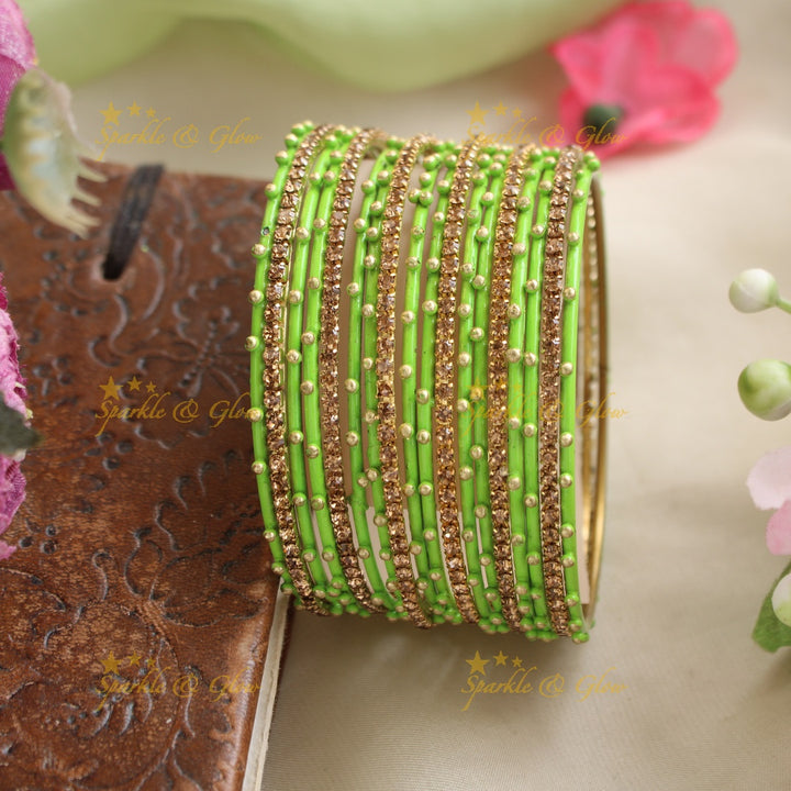 Beautiful Bubble design Metal Bangle Combo Box in Assorted colours with gold stone bangles