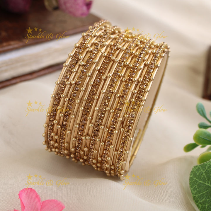 Beautiful Bubble design Metal Bangle Combo Box in Assorted colours with gold stone bangles