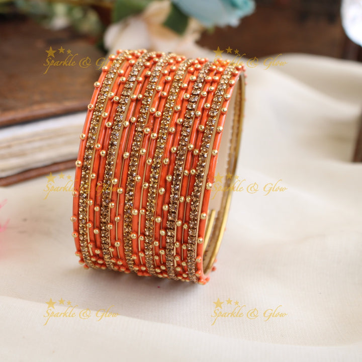 Beautiful Bubble design Metal Bangle Combo Box in Assorted colours with gold stone bangles