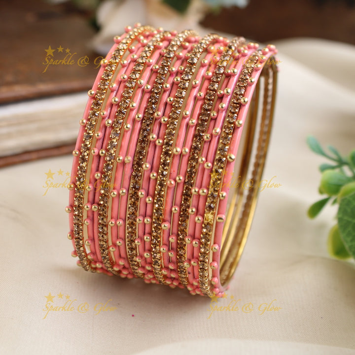 Beautiful Bubble design Metal Bangle Combo Box in Assorted colours with gold stone bangles
