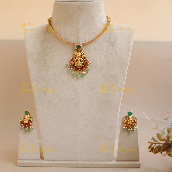 Statement Lakshmi carved pendant Chain with coral emerald and mint green beads