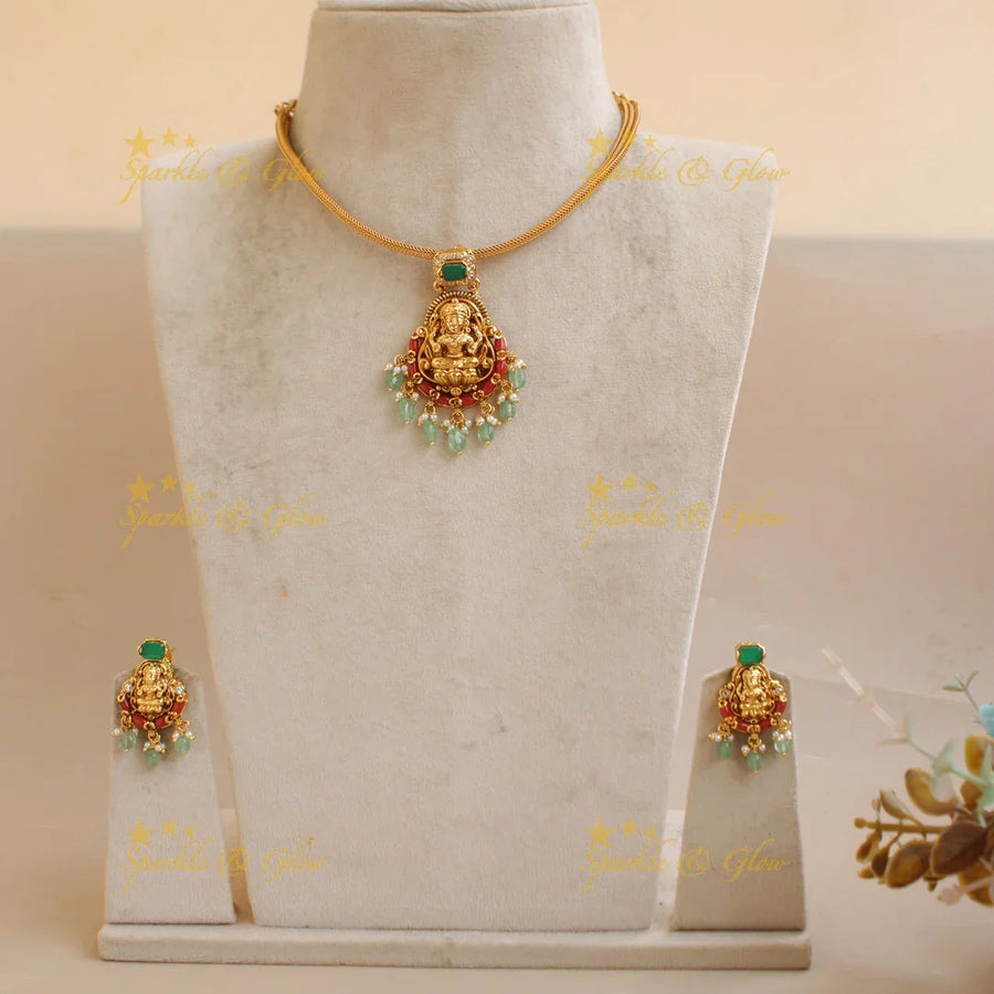 Statement Lakshmi carved pendant Chain with coral emerald and mint green beads - Sparkle and Glow