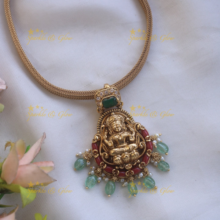 Statement Lakshmi carved pendant Chain with coral emerald and mint green beads
