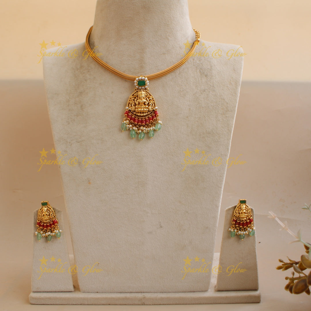 Beautiful Lakshmi peacock carved pendant Chain with coral emerald and mint green beads